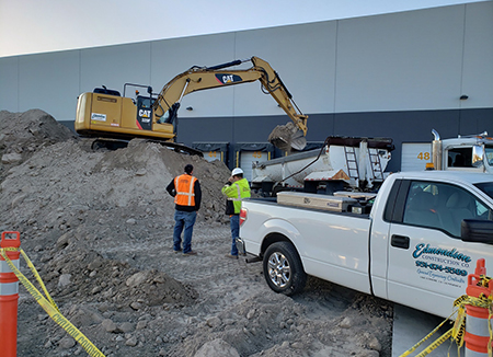 Photo Of An Edmondson Construction CAT 320F Excavator At Work On The Jobsite