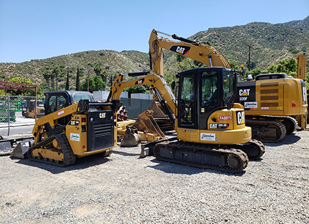 Photo Of An Edmondson Construction CAT 249D Skid Steer, CAT 305.5 Mini-Ex AND CAT 320F Excavator On The Edmondson Lot